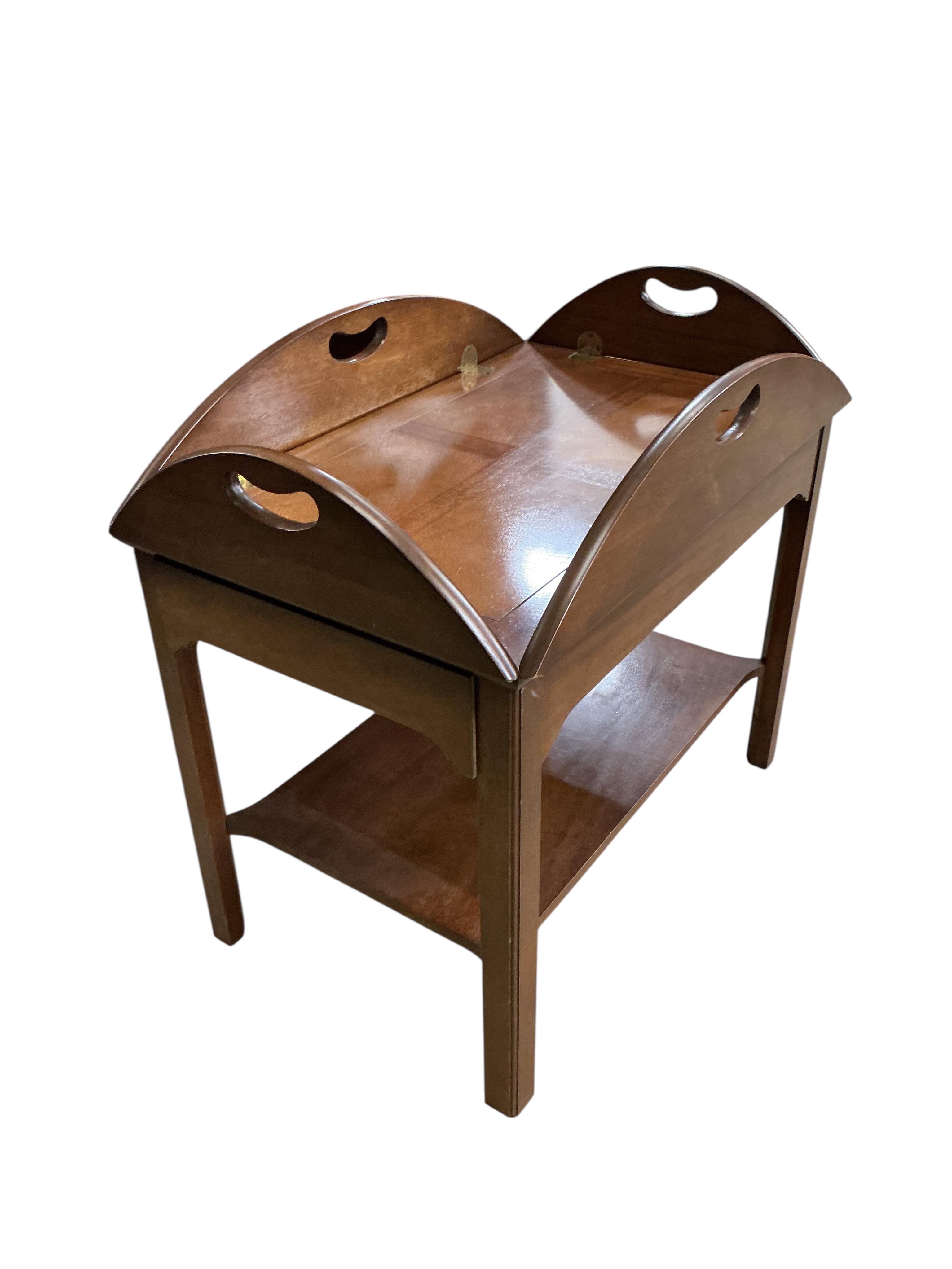 A reproduction George III style mahogany butler's tray, on stand, width 74cm, depth 48cm, height 68cm